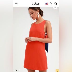 New with tags Lulus red orange multi stripe tie back mini dress. Size small.